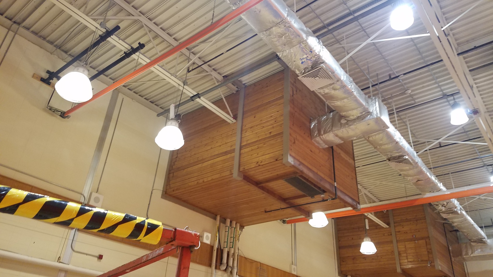 Existing Cumberland High School gym HVAC system before improvements